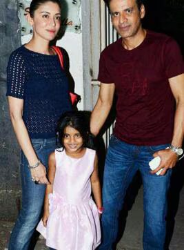 Ava Nayla as a child walking with her mother Neha and father Manoj Bajpayee on an evening out in Mumbai.